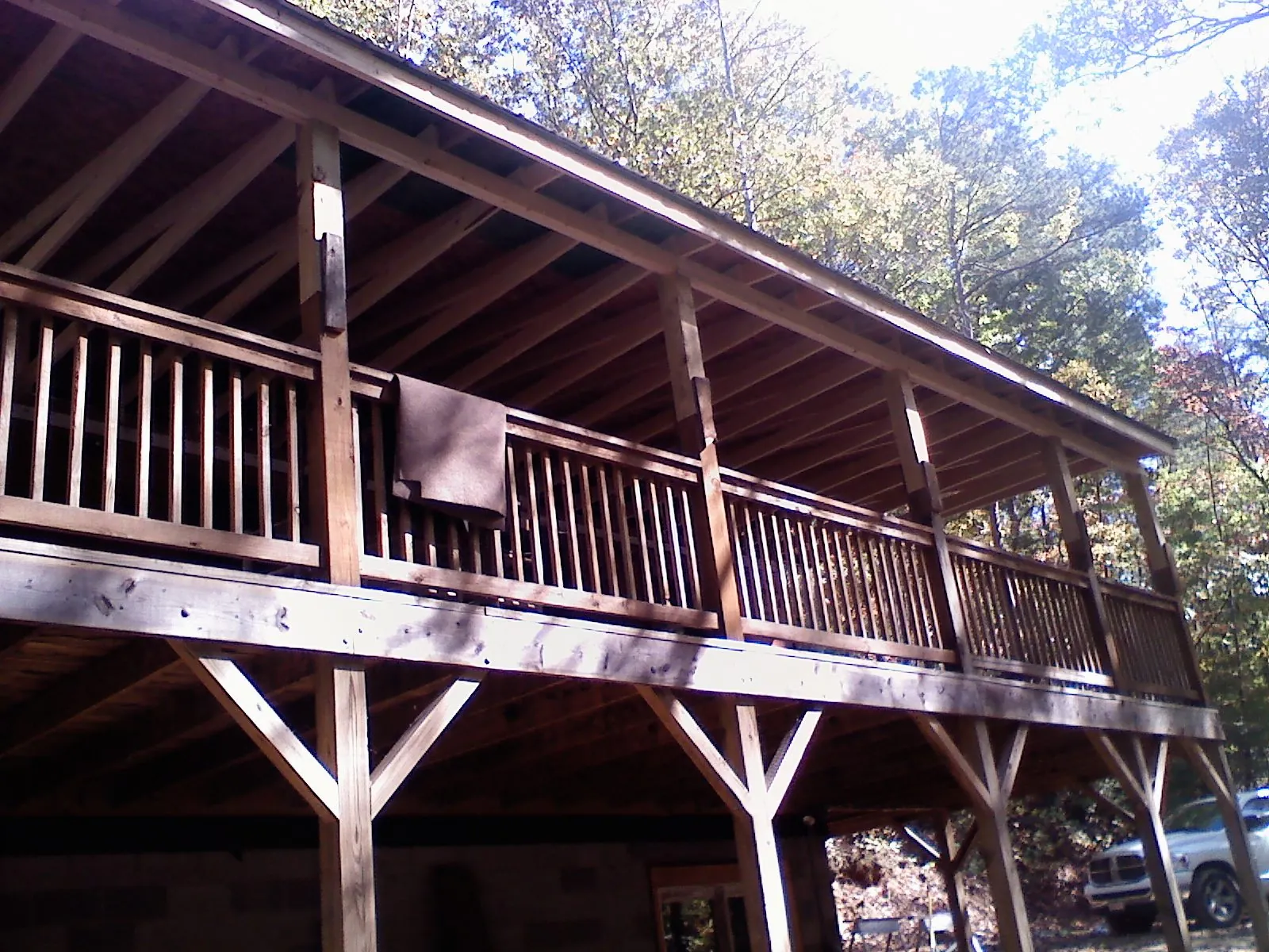 Timber framing under a new elevated porch and deck — Roof Leak Repair in Brewster by Roofing Brothers
